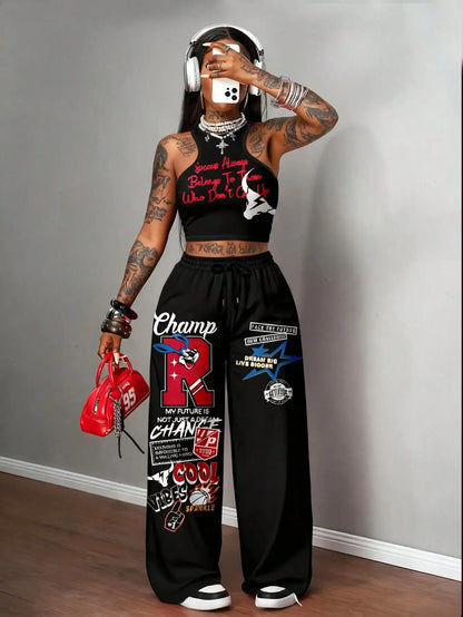Graphic racerback crop top & wide leg pants set for streetwear.