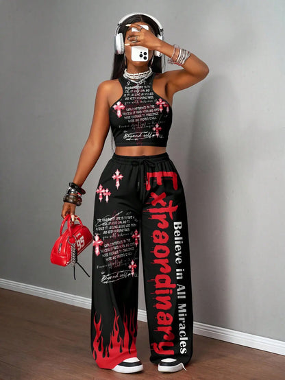 Graphic racerback crop top & wide leg pants set for streetwear.