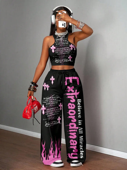 Graphic racerback crop top & wide leg pants set for streetwear.