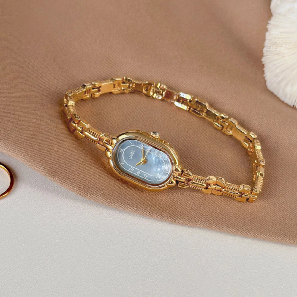 Fashion ethos minimalist luxury disc gold bracelet with quartz watch for women. 1piece.