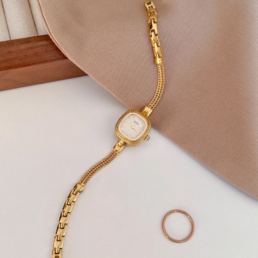 Fashion ethos minimalist luxury disc gold bracelet with quartz watch for women. 1piece.