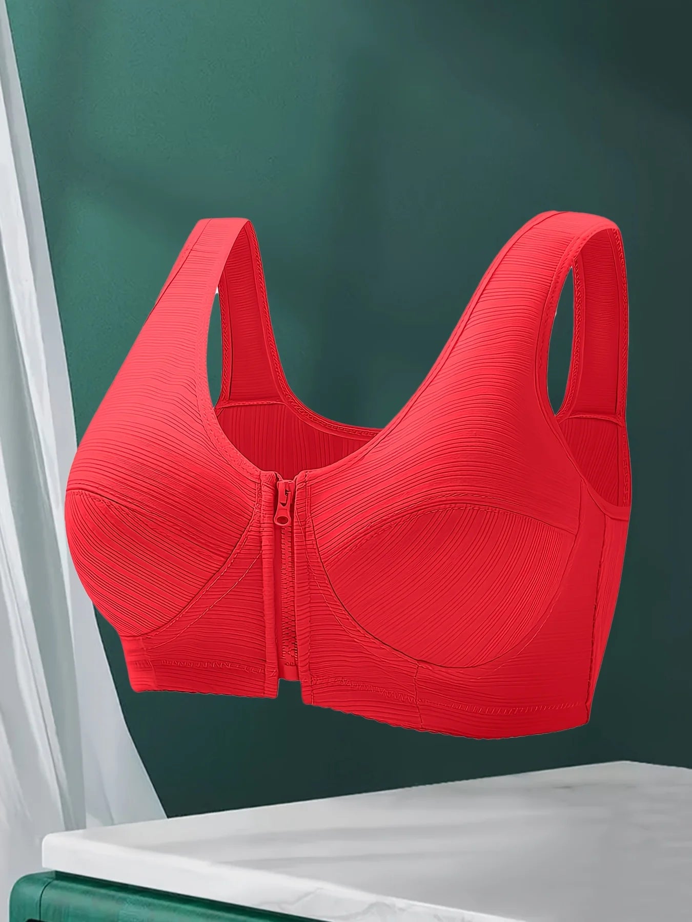 Three pieces of wireless, comfortable women's front-closure brassieres for women's lingerie and undergarments.