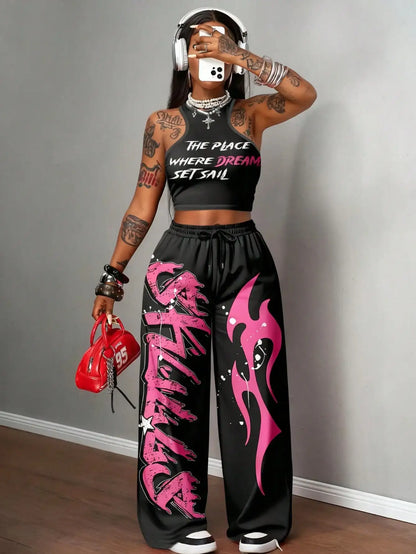 Graphic racerback crop top & wide leg pants set for streetwear.